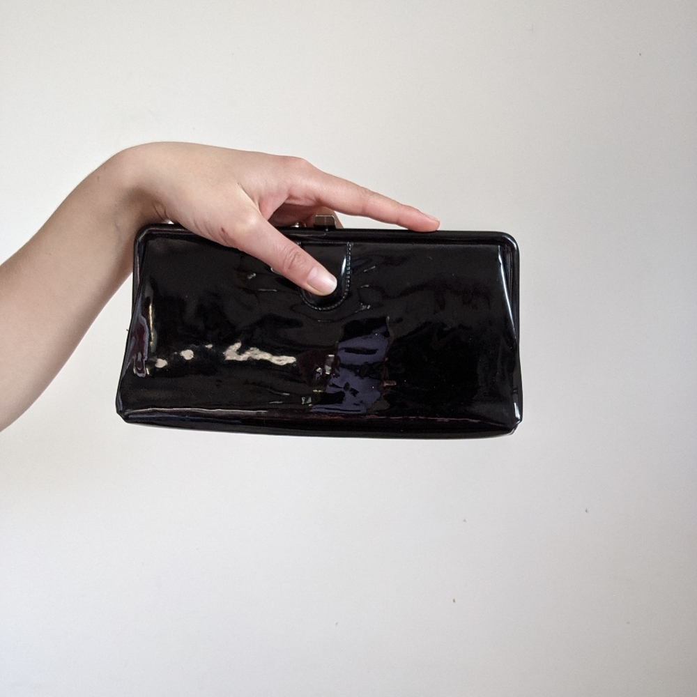 Vintage patent leather clutch with gold clasp
